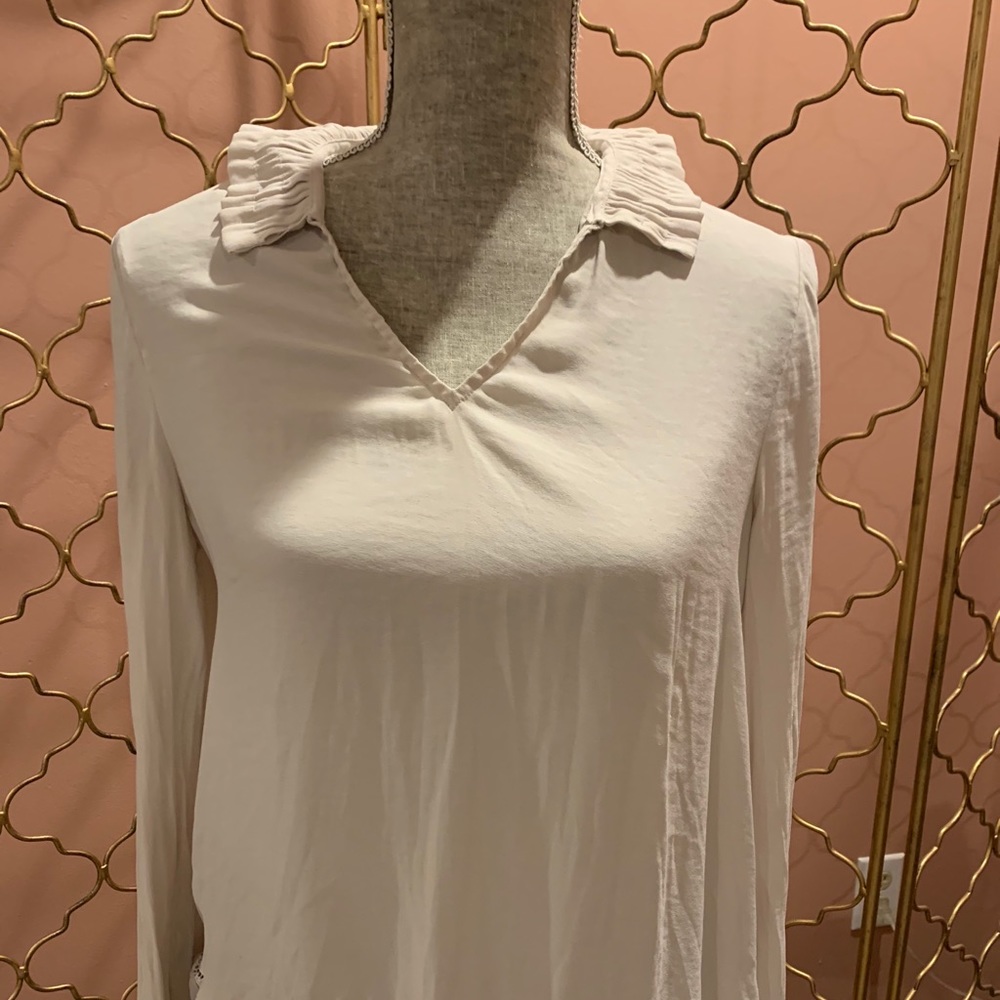 Off white ruffle blouse